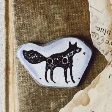 snowy fox button 
