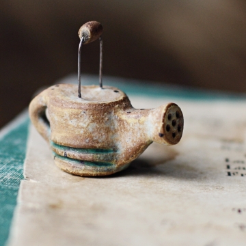 weathered watering can 