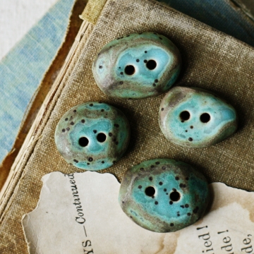 skipping stones- ceramic buttons 
